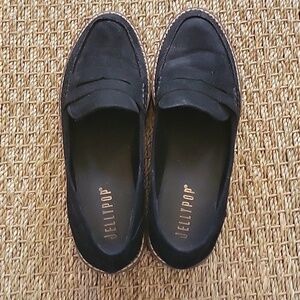 JELLYPOP black faux suede loafers.  Platform heel. White stitching size is 10M